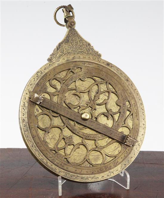 A Persian engraved brass astrolabe, probably 19th century, 6in.